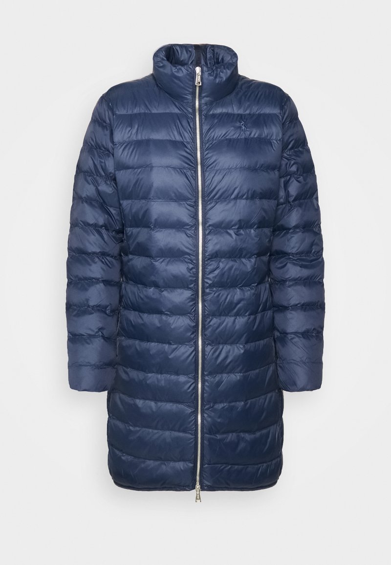 Navy blue puffer coat with a high collar, horizontal quilted design, full front zipper, and long sleeves. Smooth, shiny exterior fabric.