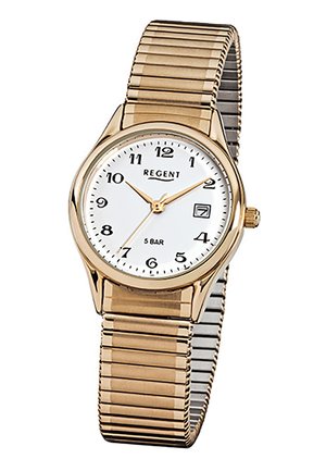 Montre-bracelet dorée avec cadran blanc, chiffres arabes noirs, trois aiguilles dorées, guichet de date à 3 heures et bracelet métallique extensible.