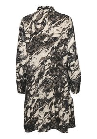 Robe à manches longues avec un motif abstrait noir et crème, dotée d'un ourlet à volants, d'un col et d'un tissu doux et texturé.