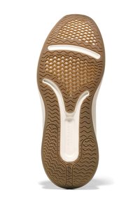 Sole della scarpa con fondo in gomma, con un design testurizzato a nido d'ape di colore marrone chiaro, accentuato da scanalature bianche ed elementi di branding.