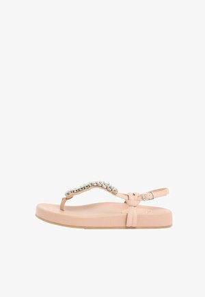Hellrosa flache Sandale mit Zehensteg und Knöchelriemen, verziert mit einer Reihe großer klarer Strasssteine auf dem oberen Teil.