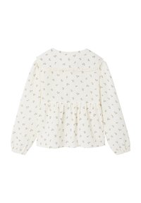 Cream long-sleeve blouse with small brown floral pattern, ruffled collar, and gathered waist, shown from the back on white background.