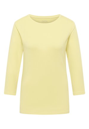 T-shirt à manches longues jaune en coton ; doté d'un col rond et d'une texture lisse sans motifs ni accents visibles.