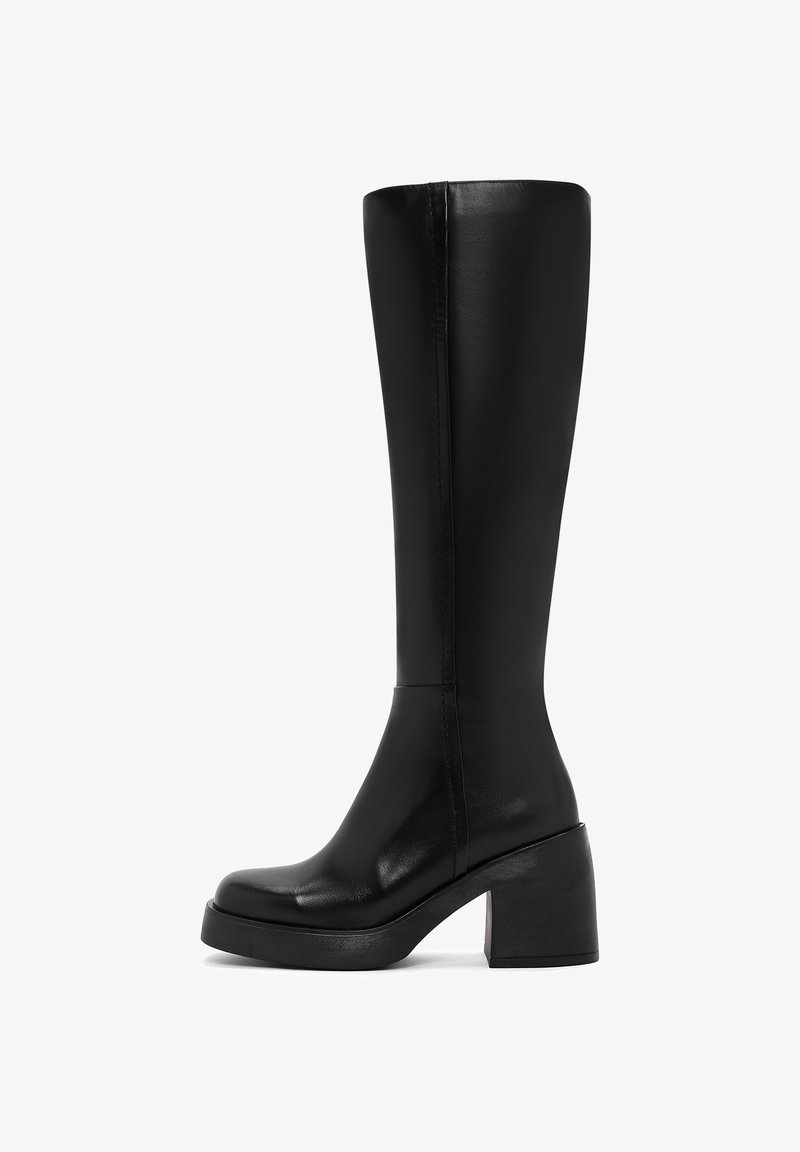 Black knee-high boots made of smooth leather with a block heel, rounded toe, and minimalistic design. Seam detailing along the side.