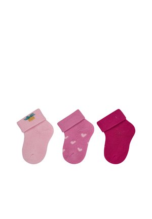 Three pairs of baby socks in shades of pink: light pink with pineapple, medium pink with white hearts, and dark pink plain.