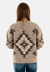 Brown patterned sweater with a diamond design, made of textured material. Ribbed hem, featuring dark accents on a light background.
