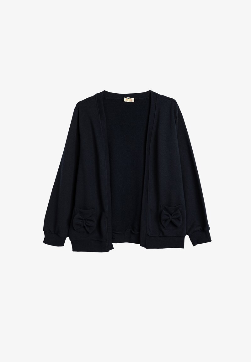 Cardigan nero realizzato in tessuto morbido, con maniche lunghe, apertura frontale e due tasche anteriori decorate con fiocchi.