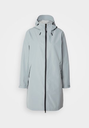 Veste imperméable gris clair avec capuche, fermeture éclair sur le devant et accents noirs. Elle dispose de poches latérales et a une coupe décontractée jusqu'aux genoux.