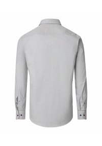 Herenoverhemd met lange mouwen en een klein donker stippenpatroon, van achteraf getoond op een witte achtergrond.