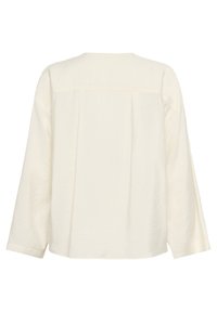 Cream-colored long-sleeve blouse with a relaxed fit, featuring a back yoke seam and subtle crinkled texture.