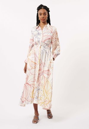 Robe longue à boutons en tissu léger. Présente un imprimé floral dans des nuances de rose, jaune et bleu. Inclut des poches latérales et une taille froncée.