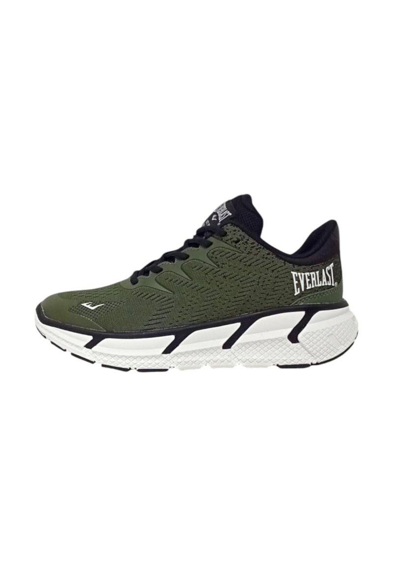 Scarpa da ginnastica verde con accenti neri, parte superiore testurizzata e suola bianca con un design a motivo. Logo sul lato e sulla linguetta.