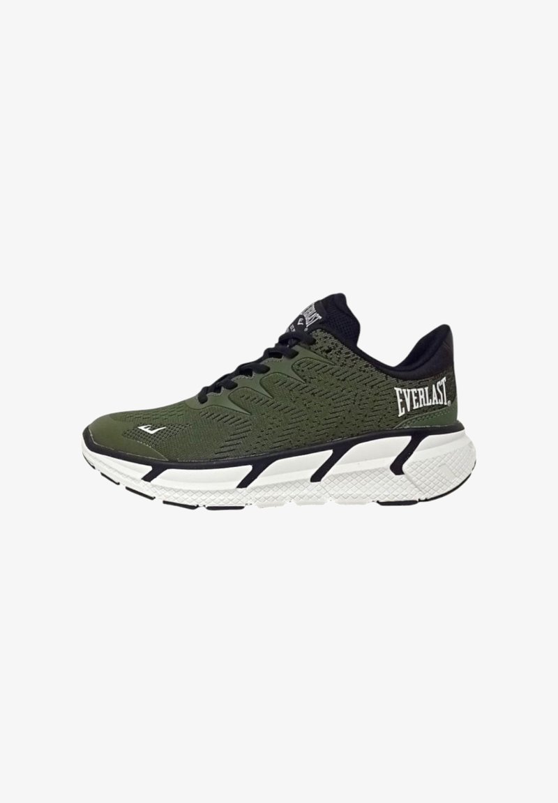 Scarpa da ginnastica verde con accenti neri, parte superiore testurizzata e suola bianca con un design a motivo. Logo sul lato e sulla linguetta.