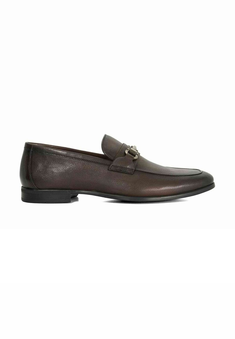 Brown leather loafers with a smooth texture, a decorative strap with hardware, slim silhouette, and rounded toe. Flat rubber sole.