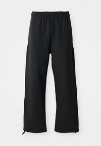 Schwarze weit geschnittene Hose aus weichem Stoff, mit elastischem Bund und Kordelzug, seitlichen Taschen und glatter Textur.