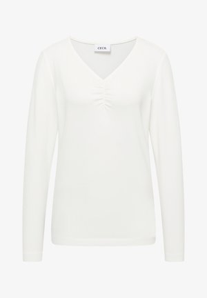 Top blanco de manga larga con escote en V y detalles fruncidos en el pecho. Textura suave y diseño ajustado. Etiqueta de la marca: CECIL.
