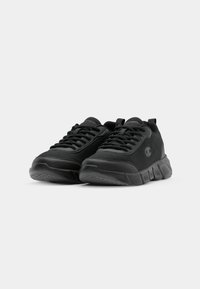 Black athletic shoes made of mesh and synthetic materials with textured surface, lace-up design, padded collar, and logo on the side.