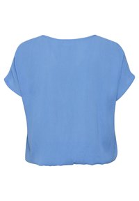 Chemisier bleu clair uni à manches courtes et coupe ample, vu de dos sur fond blanc.