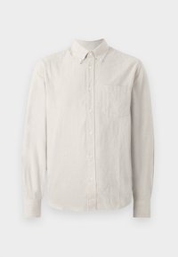 Knappskjorte i lys beige med tynne vertikale striper, lange ermer, krage og en enkelt brystlomme. Mykt stoff med en glatt tekstur.