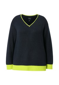 Mörkblå tröja med V-ringning, ribbad mudd och nederkant. Har klara limegröna detaljer vid ringningen och nederkanten. Mjuk textur.