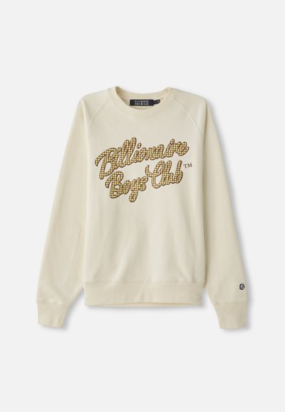 Cream crewneck sweatshirt with long sleeves, featuring yellow and brown checkered "Billionaire Boys Club" text across the chest.
