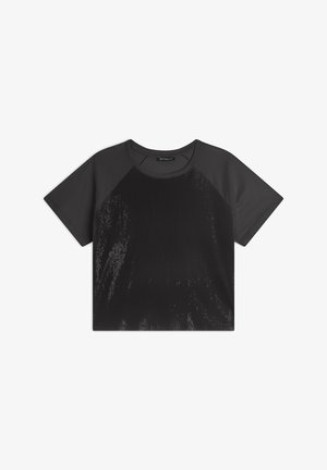 Camiseta de manga corta raglán negra con un tejido texturizado, que presenta mangas suaves y un diseño en degradado con un ligero brillo.