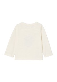 Ein schlichter, cremefarbener Langarmshirt für Kleinkinder, von hinten gezeigt, mit rundem Ausschnitt und einfacher Naht.