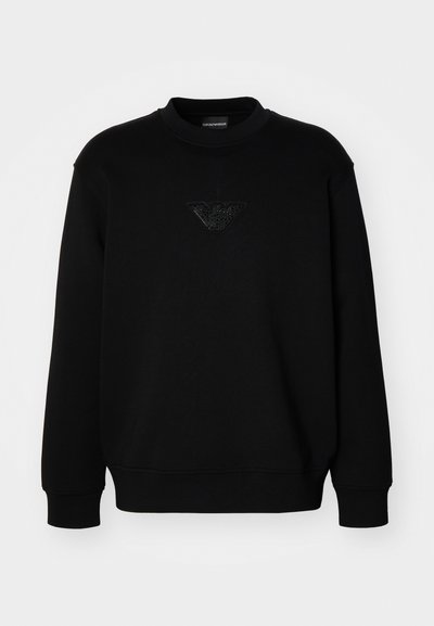 Black sweatshirt made of cotton blend with a crew neckline, featuring a textured black logo on the chest and ribbed cuffs and hem.