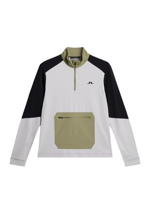 Halv-zip sweater med lange ærmer. Hvid krop, sorte ærmer og en olivengrøn lomme. Har en lynlåslomme på fronten.