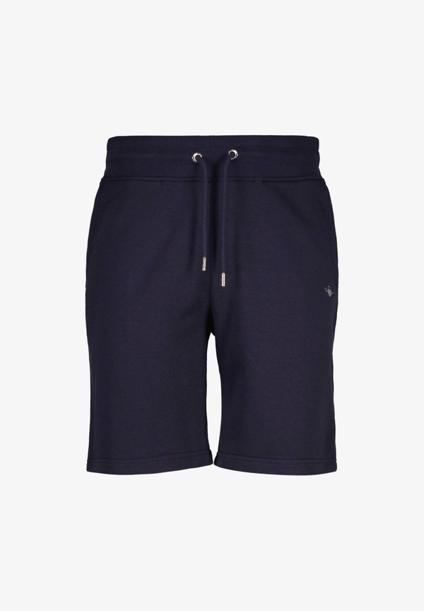 REG SHIELD - Tracksuit bottoms - blau