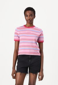 Short-sleeve pink striped t-shirt with blue, red, and white horizontal stripes. Ribbed crew neck and logo printed on front.