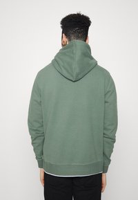 Calvin Klein Felpa con cappuccio - light green