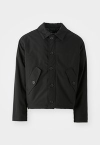 Black cropped jacket made of smooth fabric. Features a button-up front, pointed collar, and two angled pockets on the sides.