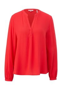 Blouse rouge à manches longues avec un col en V léger, dotée de poignets froncés et d'une coupe ample et fluide.