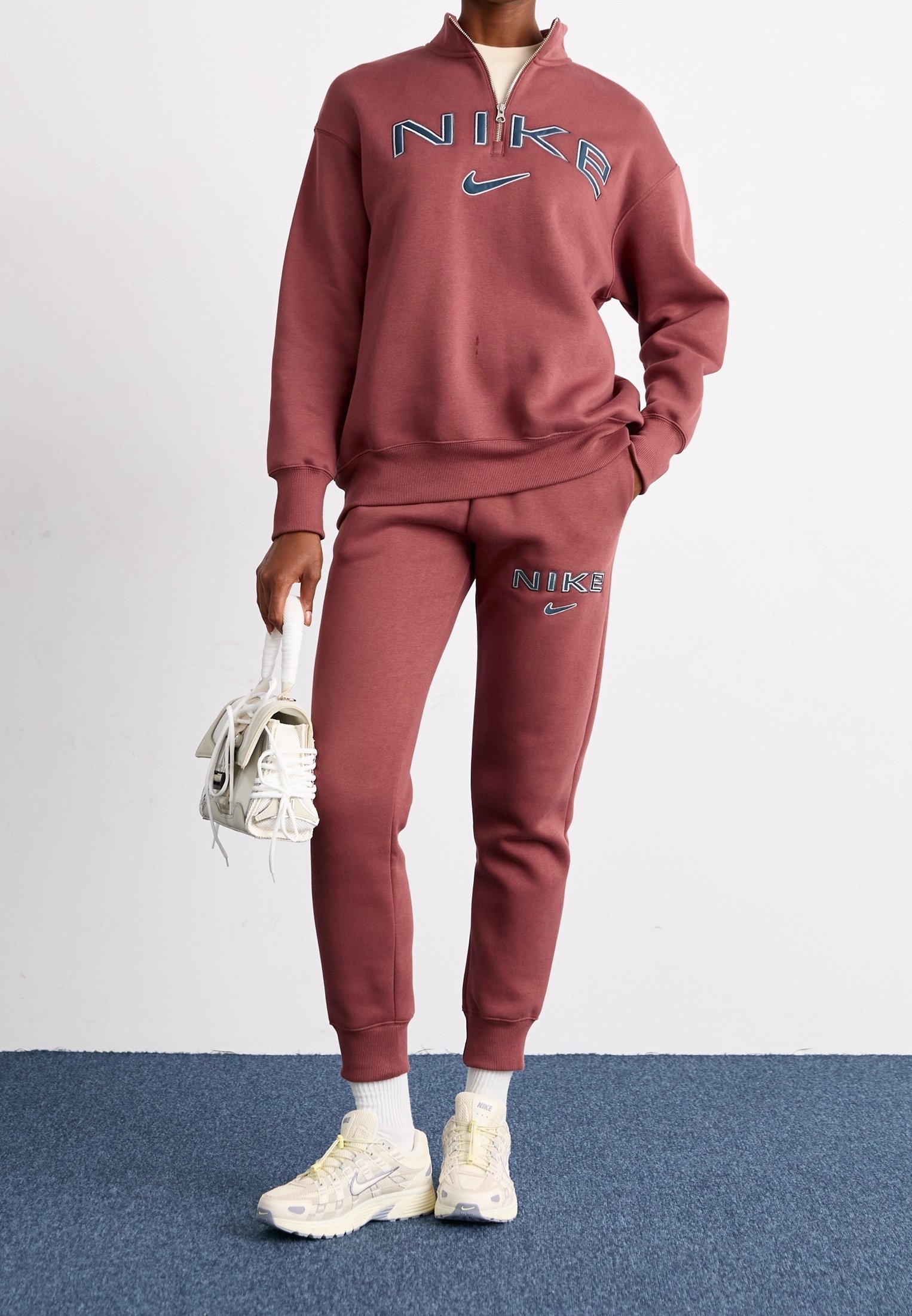 coral nike tracksuit