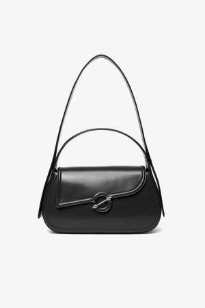 Black leather shoulder bag with a curved flap secured by a round metal clasp and a slim, adjustable strap.