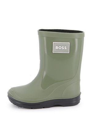 Botte en caoutchouc verte avec une semelle noire et un patch logo gris affichant le mot "BOSS". Conçue avec une surface lisse et un bout rond.