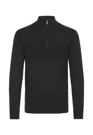 Musthave mustrõm, millel on pooltõmblusega kaelus, tekstuuriga paneelidega rinnal ja soonikkoes varrukate ning äärtega. Valmistatud pehmest kangast.