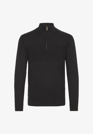 Černý svetr s částečným zipem u límce, s texturovanými panely na hrudi a žebrovanými manžetami a dolním lemem. Vyrobeno z měkké tkaniny.