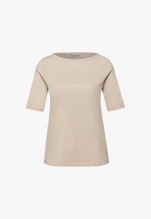 Beżowy damski T-shirt z krótkim rękawem i okrągłym dekoltem, o prostym kroju, z małą metką marki wewnątrz kołnierza.