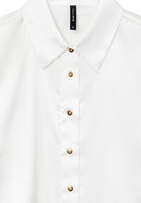 Blouse à col blanc en tissu lisse avec un devant à boutons ornés de boutons dorés et un design simple et épuré. Taille : S.