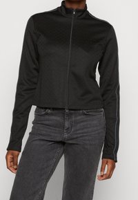 Weekday Chaqueta de entrenamiento - black