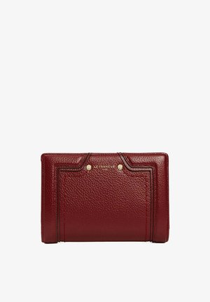 Burgundy leather wallet with a textured finish, gold hardware accents, and stitch detailing, featuring the brand name embossed on the front.