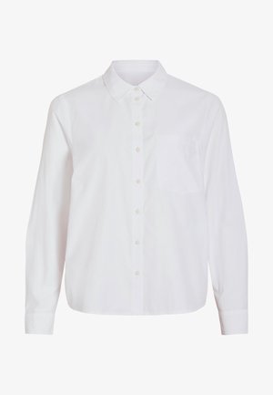 Valge pikkade varrukatega särk, esitelgedega, klassikalise kraega, ühe rinnataskuga, valmistatud siledast, kergest kangast ja lõdva istuvusega.