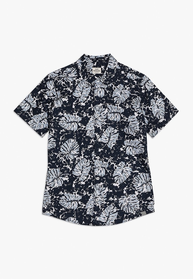 Chemise bleu marine à manches courtes avec motif de feuilles tropicales blanches et bleu clair, boutonnage sur le devant et col classique.