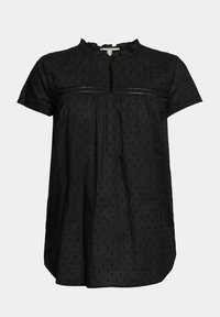 Blouse noire à manches courtes avec petit motif à pois, col volanté, ouverture en forme de goutte à l’avant et détail en dentelle horizontale sur la poitrine.