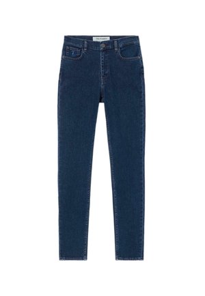 Skinny jeans made of dark blue denim. Features five pockets, a button fly, and stitched detailing along the seams.