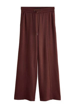Pantalon marron à jambes larges avec taille élastique à cordon et poches latérales, en tissu lisse.