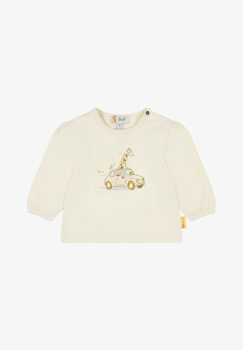 Krémová dětská košile s balónkovými rukávy, se zobrazením žirafy v žlutém autě a barevnými dekoračními prvky.
