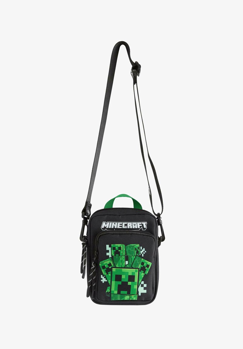 Schwarze Minecraft-Inspired Schultertasche mit grünen Akzenten, die ein pixeliertes Creeper-Design auf der Vorderseite und ein robustes, strukturiertes Material aufweist.